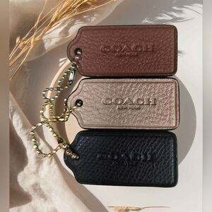 Coach CHOOSE 1, Leather Hangtags Fobs in Brown, Tan, and Black. Great Condition